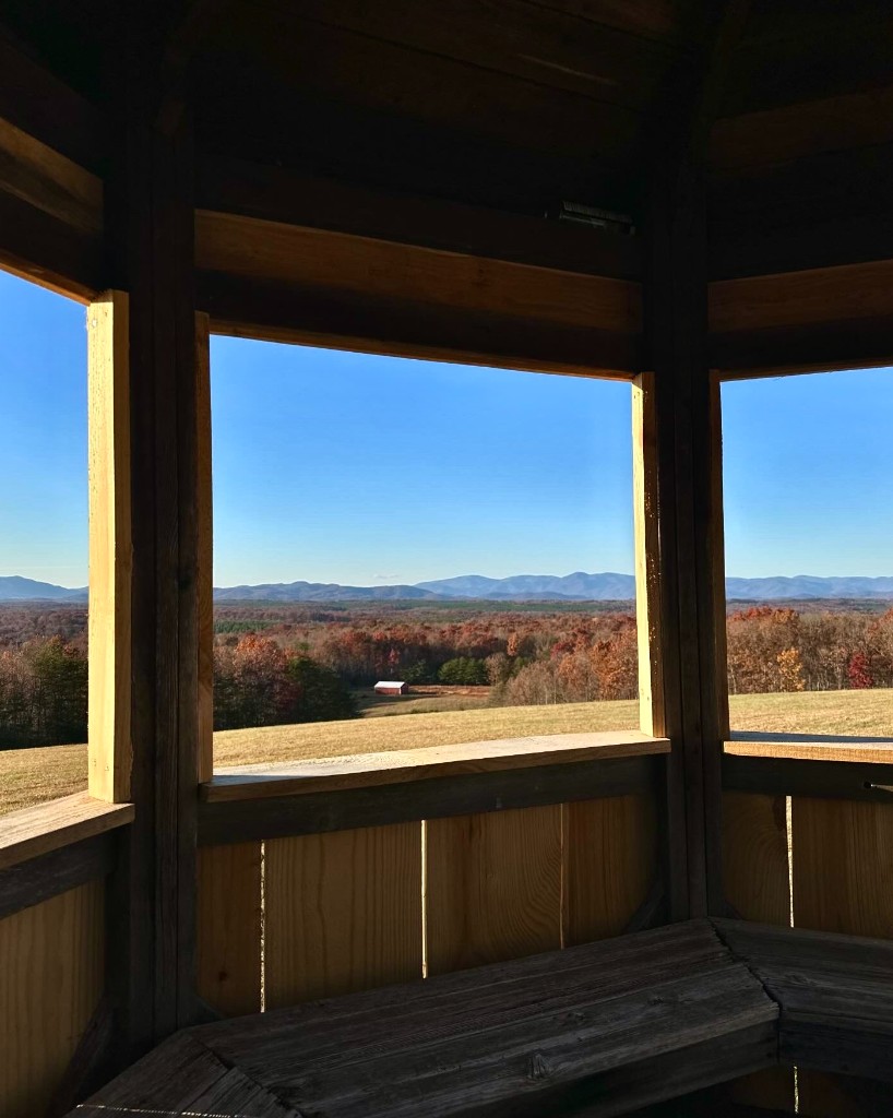 Gazebo overlook with autumn forest and mountain views