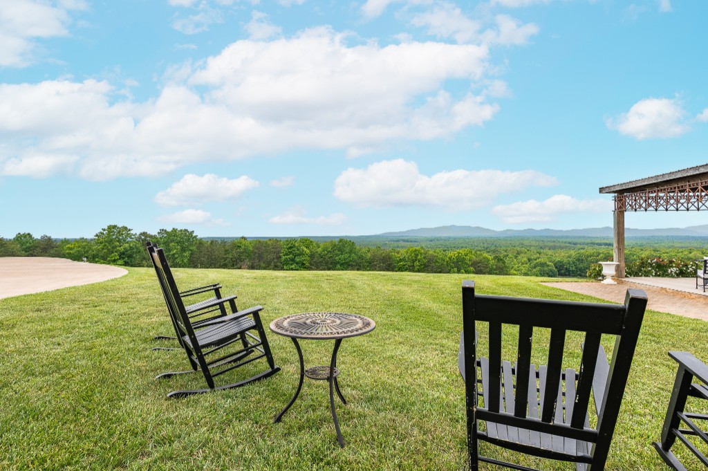 Rocking chairs on the covered porch overlooking the Blue Ridge