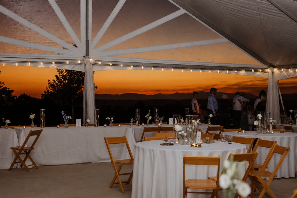 Sunset reception under tent overlooking the mountains
